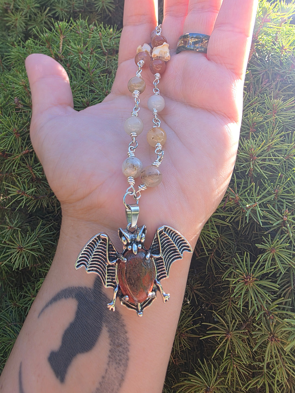 Bat and snake vertebrae necklace