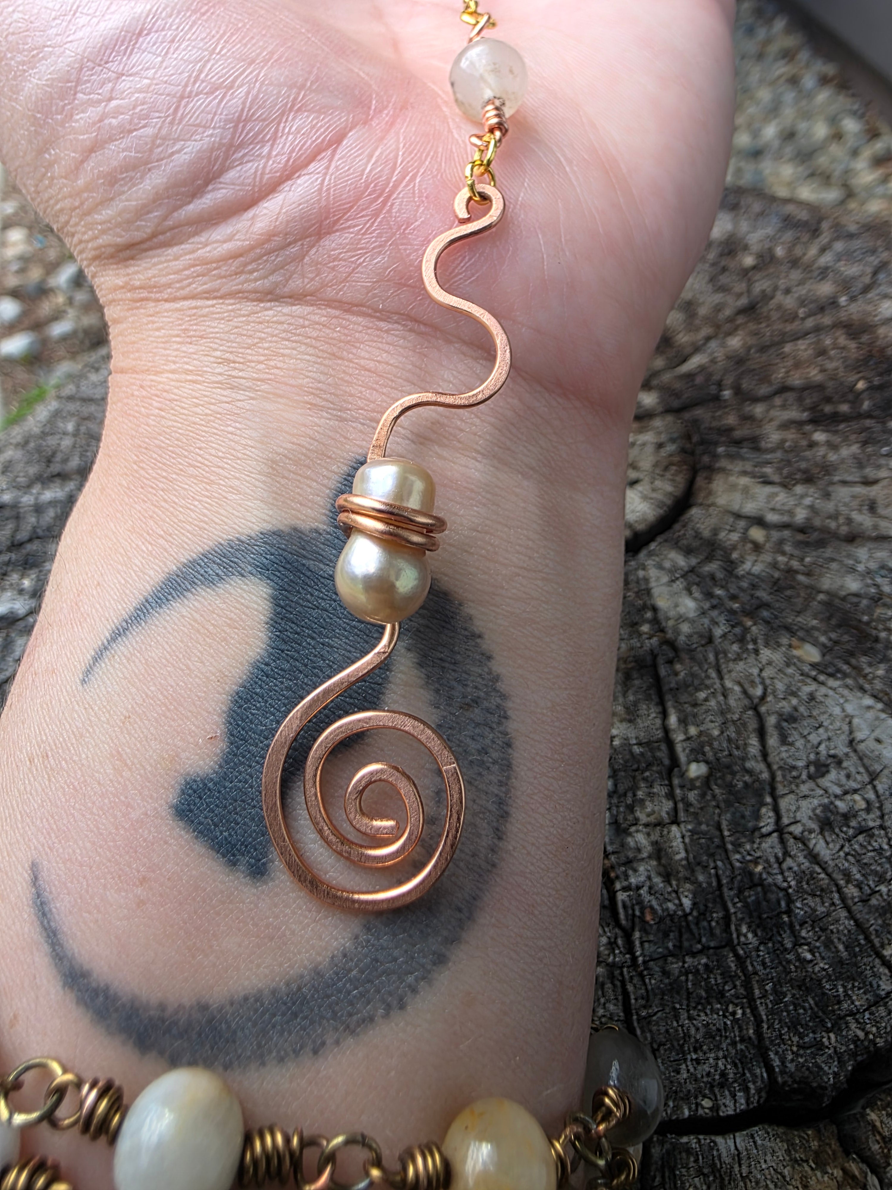 Raw pearl copper swirl necklace